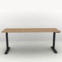 71" x 24" Height Adjustable Desk in a Black Frame and an Autumn Walnut Top